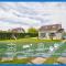 L'effet mer Maison rénovée lumineuse tout confort belle terrasse grand jardin clos sans vis à vis parking jeux pour enfants 5 mn à pied de la plage d'Asnelles et centre bourg - proche Bayeux au coeur des plages du débarquement