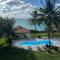 Beachfront 2BR Townhouse with Pool & Ocean View
