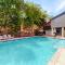 Condo with pool, hot tub, grills, washer/dryer, central AC - snowbirds welcome