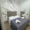 Maison Ecce Hom0