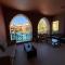 Lovely first floor tow bed rooms overviewing circular pool for families only in Talabay Aqaba