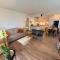 Boutique Riverview Apartment with Private Garden and Free Parking