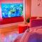 The Orange Fox Lux Room and Hot Tub at The Grumpy Schnauzer Guest House