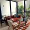 Stylish 1BR Apartment with Pool & Gym