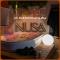 Love room Bali - jacuzzi & cinéma privé - Bretagne