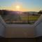 Attic floor with views over fields and sea
