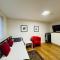 Morden flat close to DLR station with free parking and brand new bed and quality mattress adjacent to metro station also close to O2 and Excel via Cable Car