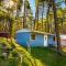 Camping Standard Bungalow Ferienwohnung auf Rügen - bis 5 Personen - nur 100m zum Naturstrand - mitten im Wald - Familien und Hunde herzlich willkommen - Feriensiedlung Schwalbennest