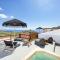 Santorini Rooftop Hot Tub Suite with Panoramic Views