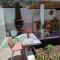 Susa and Pepe garden and house