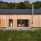 Natur und Architektur Eifel - Ferienhaus für Wellness und Yoga - Bio Designhaus mit Sauna im Vulkankrater