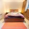 Rustic 2BR Loft Exposed Brick & Beams