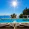 Villa St Martin-Reef - Exclusive Seafront Villa with Private Heated Pool
