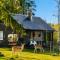 Lake Deer Park Retreat with Hot Tub & Sauna