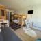Studio mongie aux pieds des pistes avec balcon