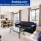 Entire Downtown Condo steps to Stampede and BMO with Parking, 1,5 hrs to Banff