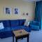Jasny apartament z widokiem na kołobrzeską katedrę