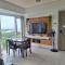 De Luxe, Standard and Studio Suites -The Breeze Residences-close to Airport,Mall of Asia, US Embassy