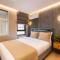 The Revia Square Hotel
