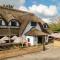 The Potters Heron - A Heartwood Inn