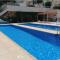 2 Bed House Sleeps 4 - Pool Sea Views Parking