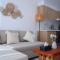 1BR Masdar City - Bright Stay with Pool & Balcony