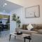 2BR Masdar City - Bright Stay with Pool & Balcony