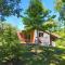 8 Chalets individuels à 1500m des cascades du Hérisson avec poêle à bois
