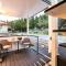 Dreamy houseboat by the sea with terrace and hot tub