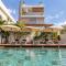 Spacious 2-bedroom apartment with shared pool 2 mins to Pereybere beach