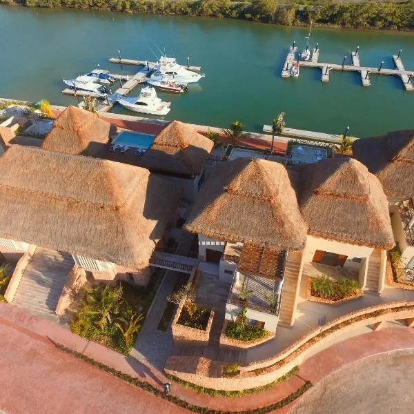 Villas Grand Marina Kinuh, hotel in Xtampú