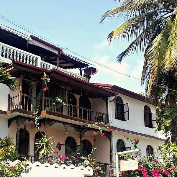 Garden Lodge, hotel i Buyu