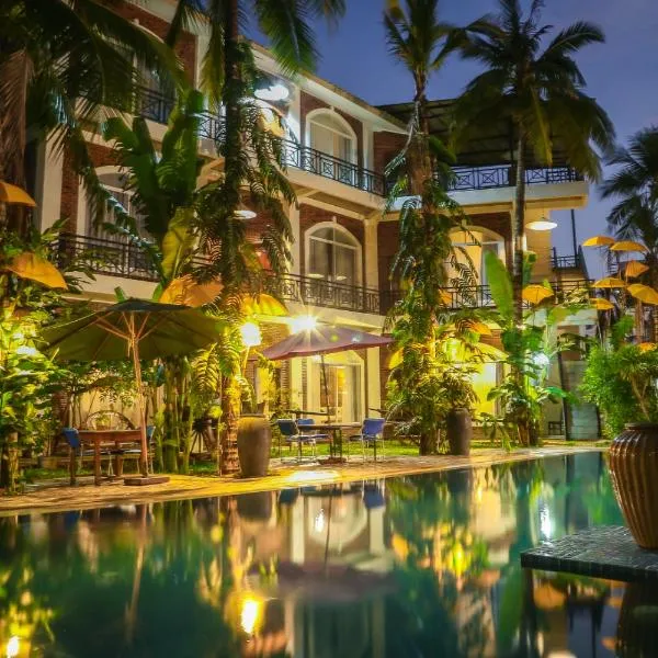 The Coconut House Hotel، فندق في Phumĭ Dong (2)