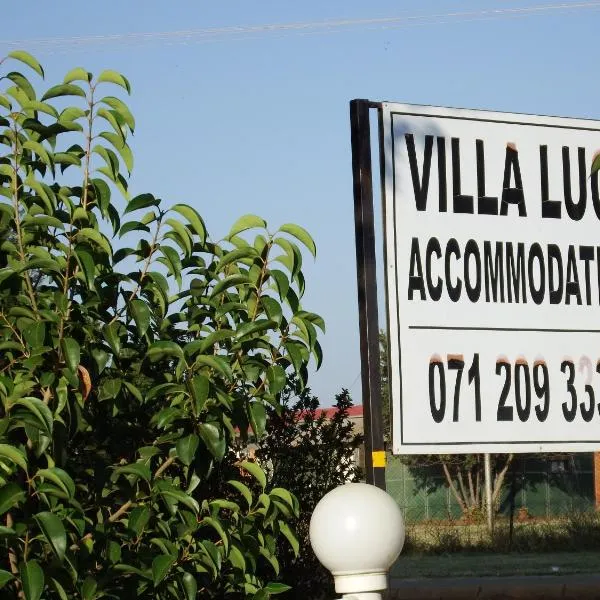 Villa Luca Guesthouse & Chalets, готель у місті Millvale
