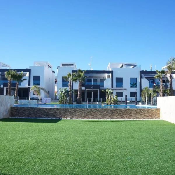 Apartment Oasis Beach La Zenia、プレヤス・デ・オリフエラのホテル