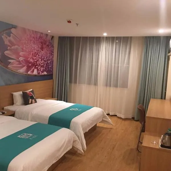 Pai Hotel Chongqing Wanzhou Gaosuntang Commerce And Trade City, מלון בWanxian
