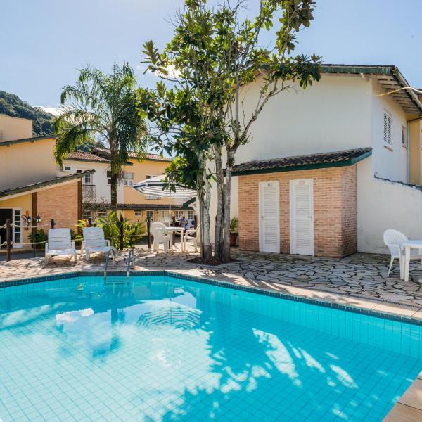 BHaus Juqueí - Beach House com 2 quartos - Cama King - Quintal com Churrasqueira Privativa - Piscina no Condomínio - 2 vagas - Condomínio com 8 casas - 600m da Praia - Ar condicionado split nos quartos e sala - Não possui roupa de cama e banho - Foto 3