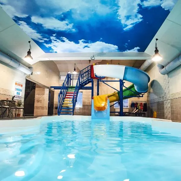Апарт-отель 5 каминов, hotel v destinaci Jasiňa