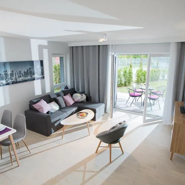 Apartament wrzos z ogródkiem – hotel w Pogorzelicy
