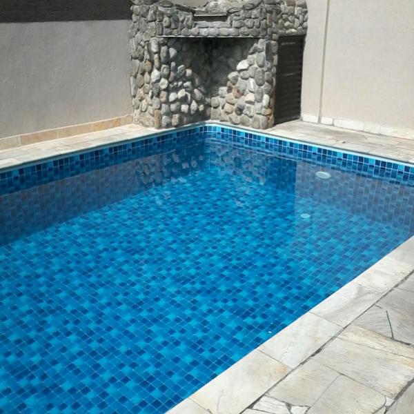 Casa familiar com Piscina Praia Grande