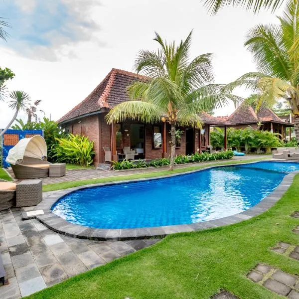 Arton Resort & Beach Club, hotel a Pulukan