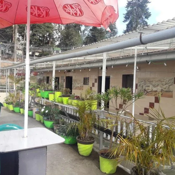 Hill Inn Rooms an HomeStay, hotel di Ooty