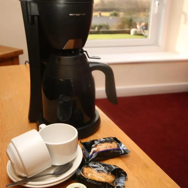 Three Wheat Heads, hotel in Thropton