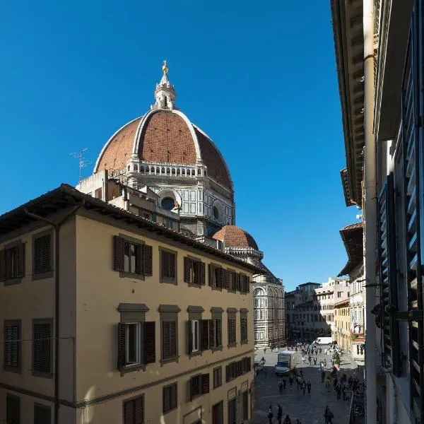 Beneath the elegant silhouette of Florence Duomo