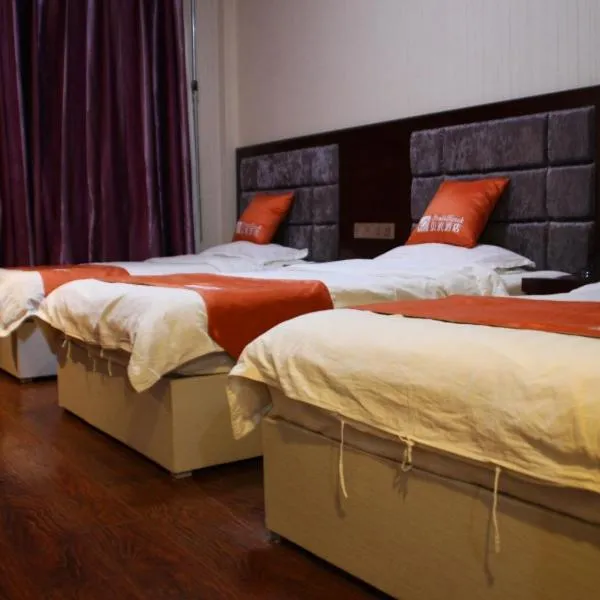 Shell Zhangye Ganzhou Area East Street Drum Tower Hotel، فندق في زهانغي