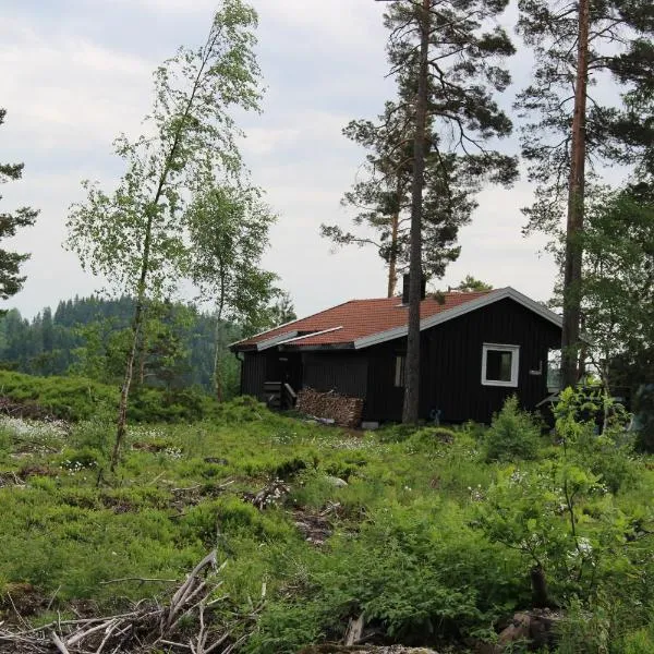 Fossheim Two-Bedroom Cottage, hôtel à Oggevatn