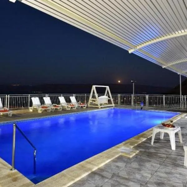 אחוזת חוף כנרת kinneret village, hotel v destinaci Tiberias