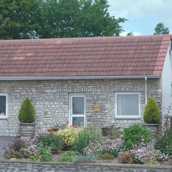 Greyfield Farm Cottages, hotel a Holcombe
