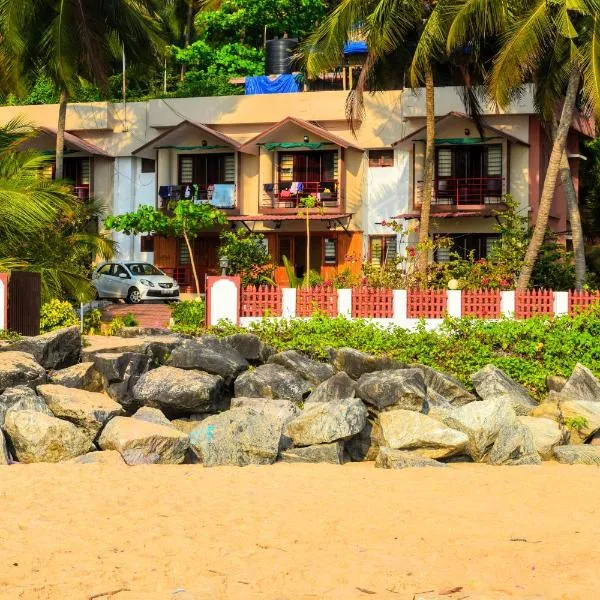 Club 7 Beach Resort, hotel in Mahe