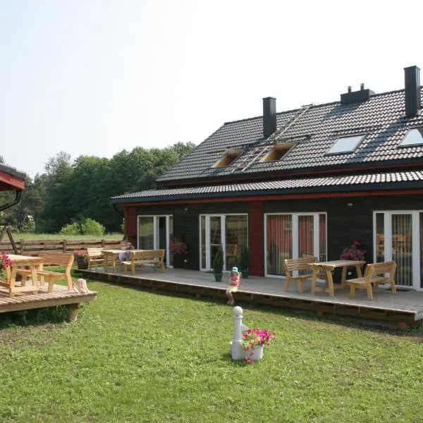 Love Island Guesthouse โรงแรมในVarnėnai